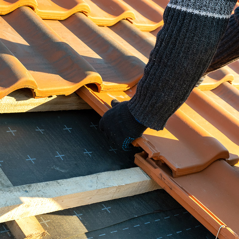 Roofers using high-quality materials on a project